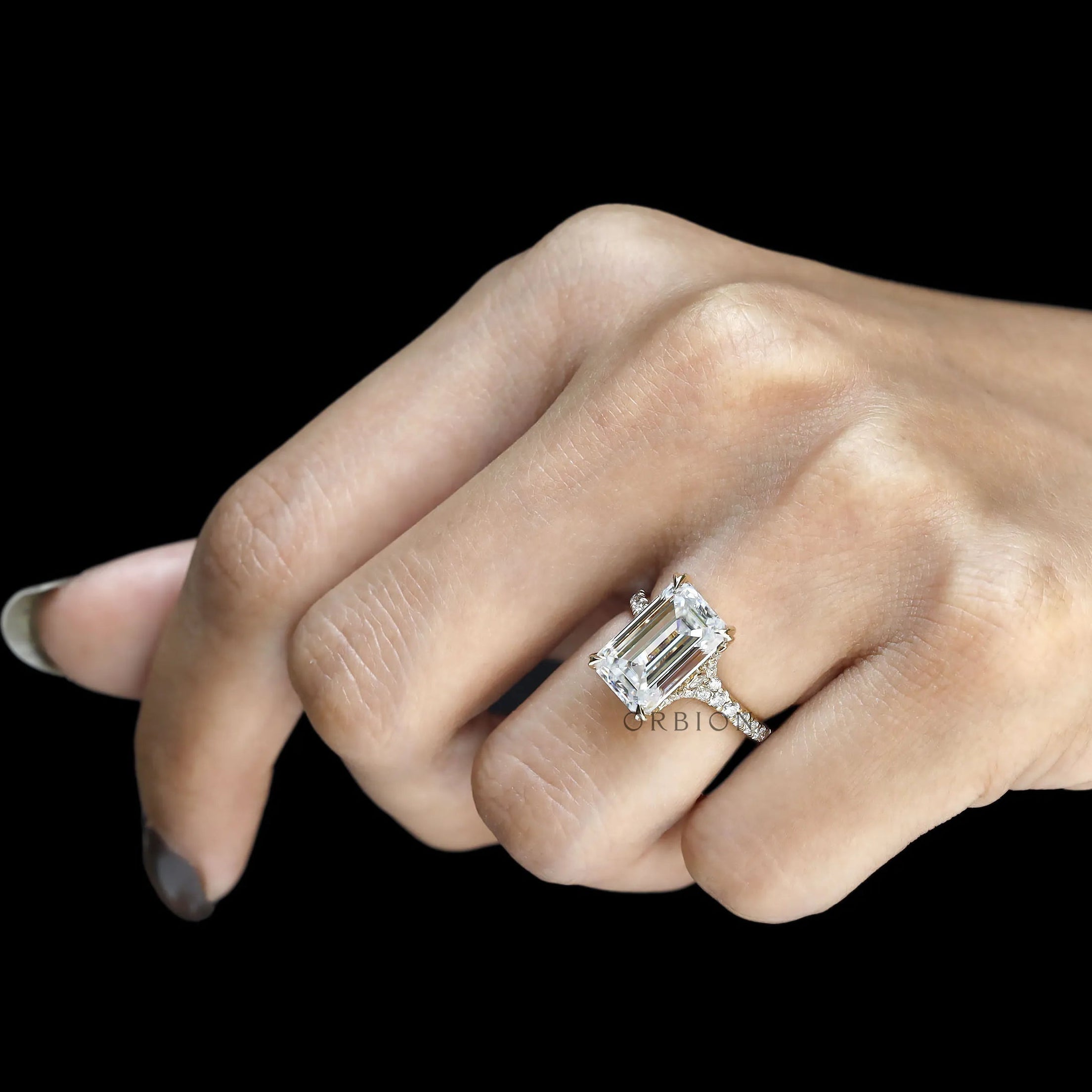 Emerald cut engagement ring with 4.5 ct moissanite, crafted in 10k yellow gold