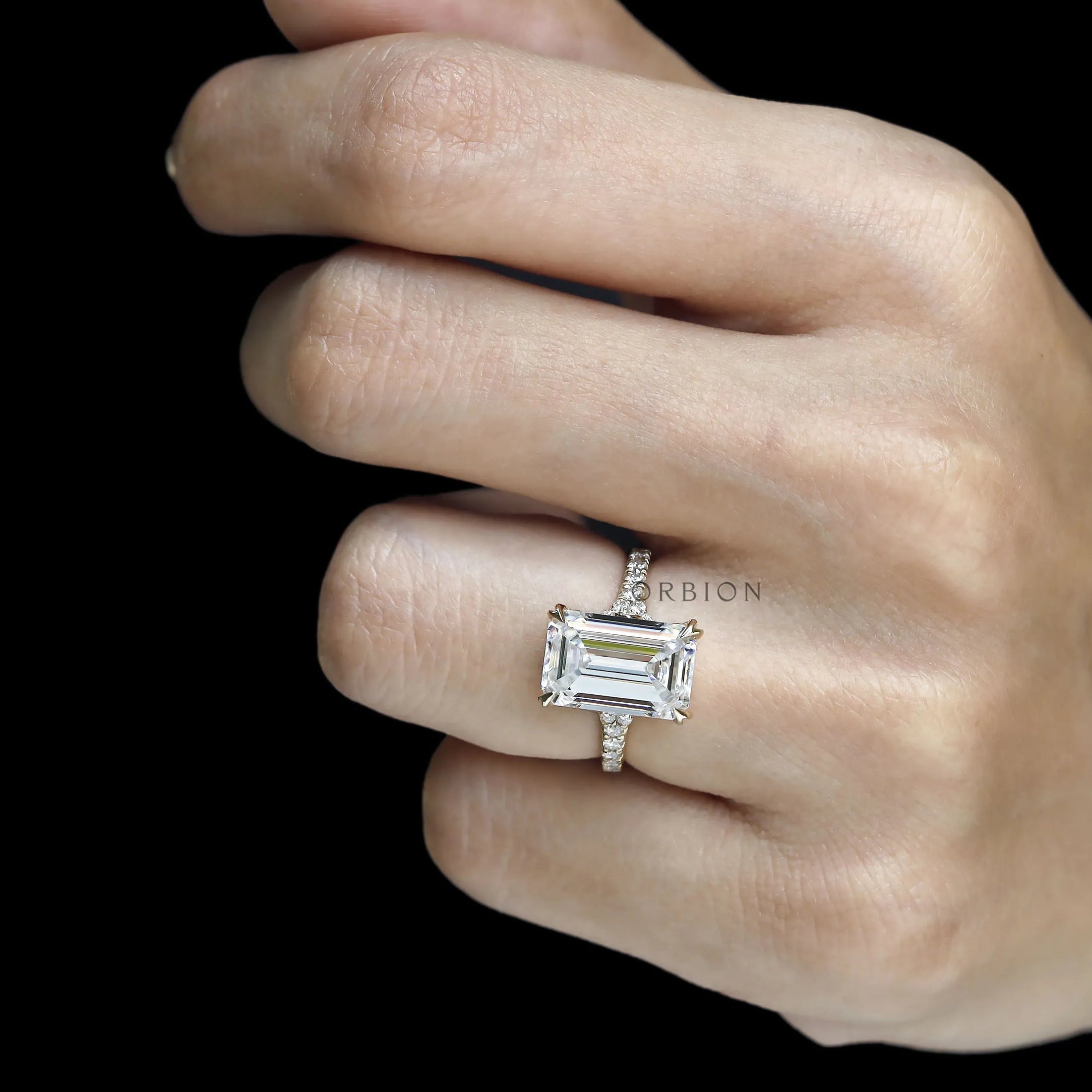 emerald cut solitaire ring in 10k yellow gold