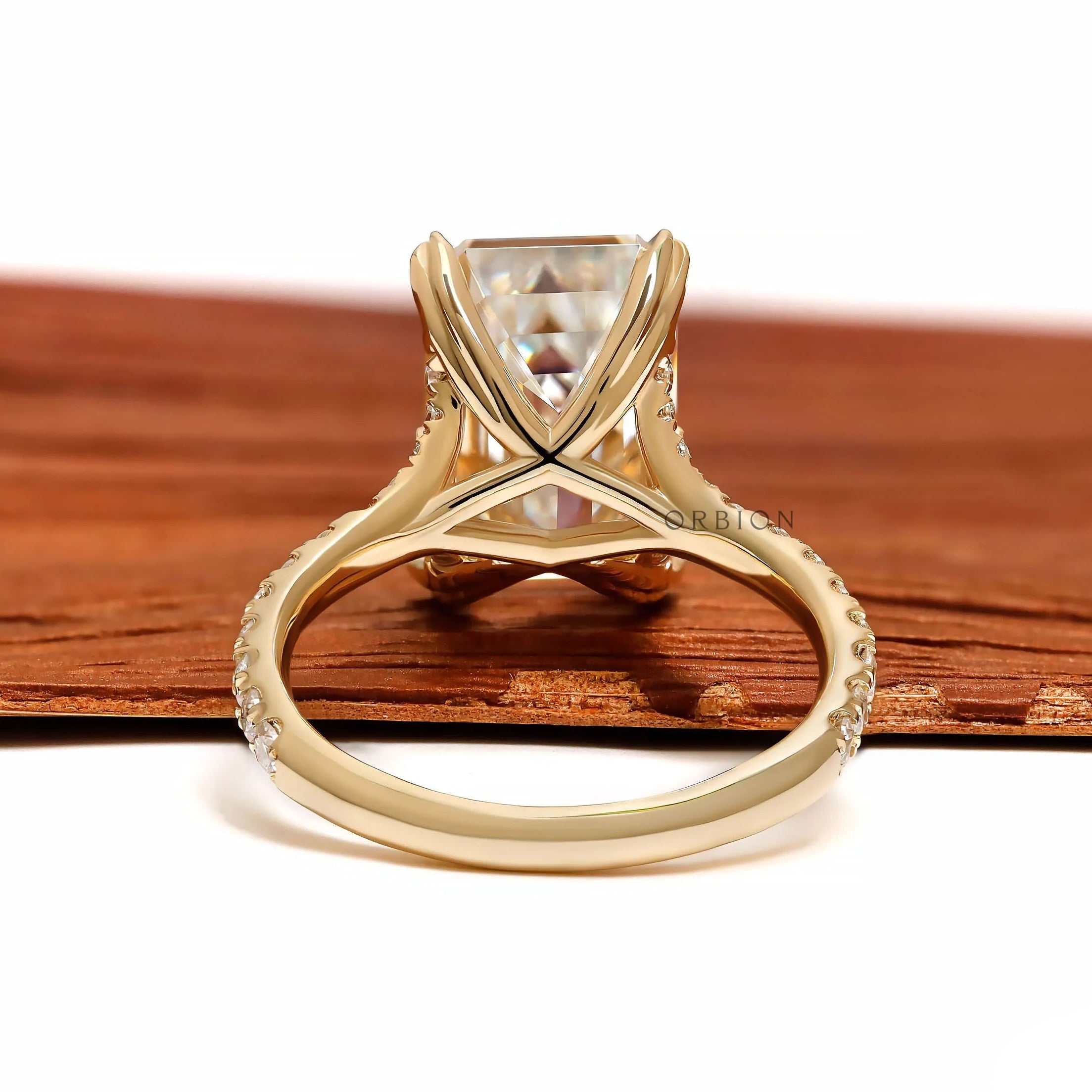 lab diamond emerald cut solitaire ring with split shank and pave detailing, 10k yellow gold