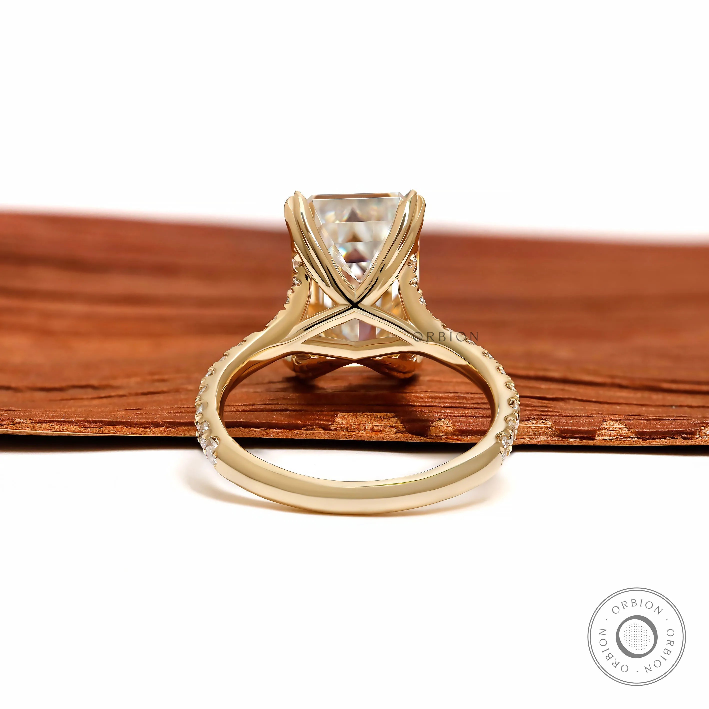 lab diamond emerald cut solitaire ring with split shank and pave detailing, 10k yellow gold