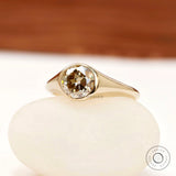 Bezel set champagne moissanite engagement ring side profile