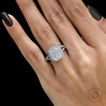 Front view of cushion lab diamond halo engagement ring with round diamond accents