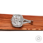 Side profile of cushion lab diamond halo engagement ring with split shank