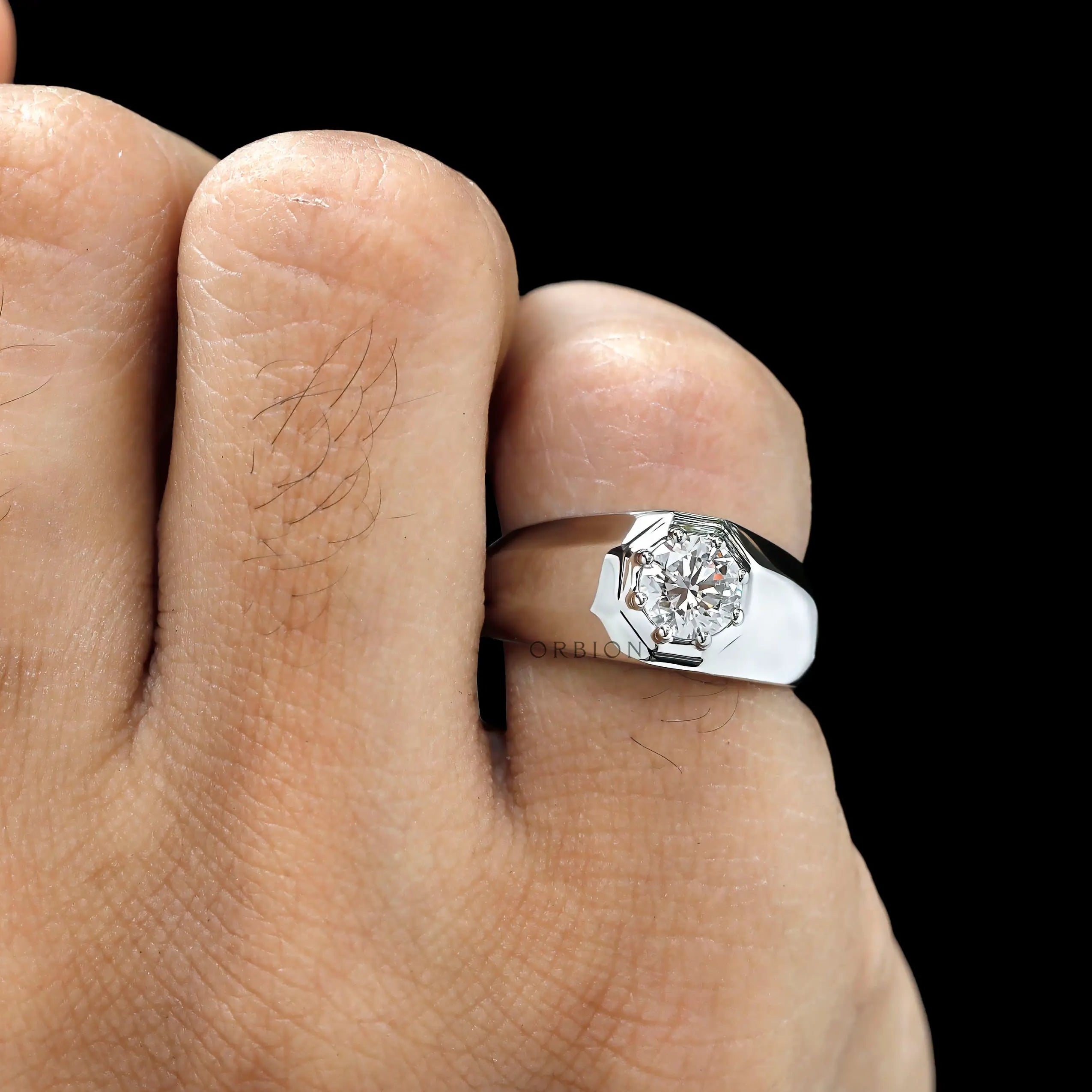 Close up of multi prong setting on men’s diamond ring