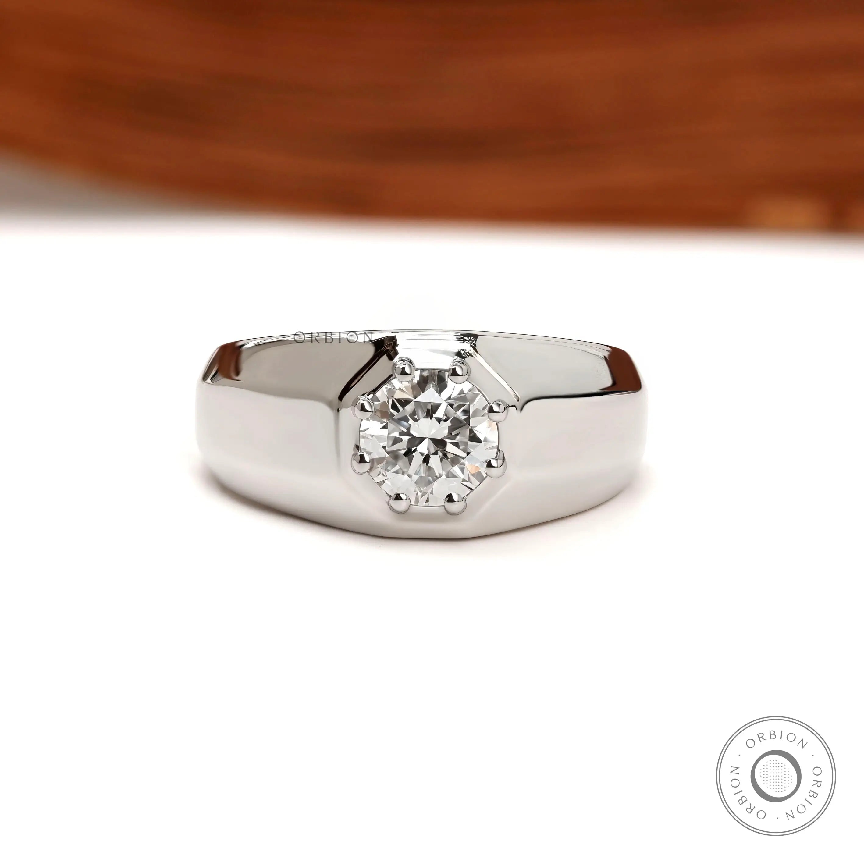 Chunky men’s diamond signet ring with tapered shank in platinum
