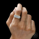 Men’s engagement ring with brilliant round lab diamond pavé setting on hand