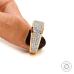Detailed craftsmanship of pavé-set diamonds in men’s ring
