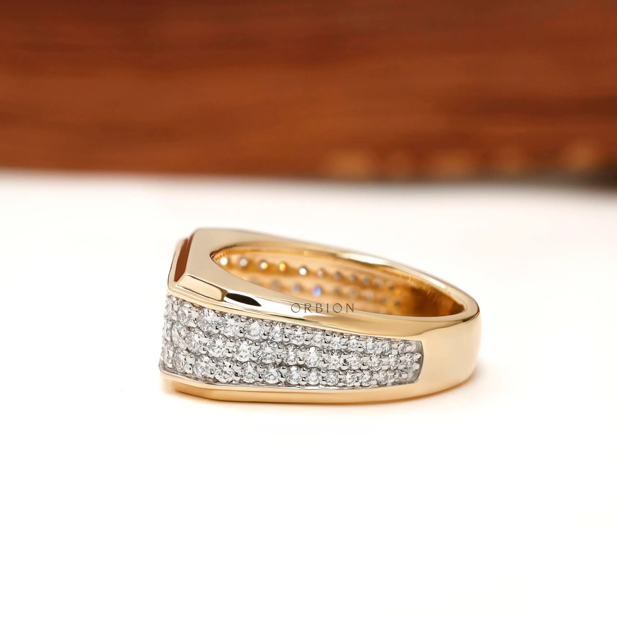 Side profile of chunky men’s wedding band with tapered shank