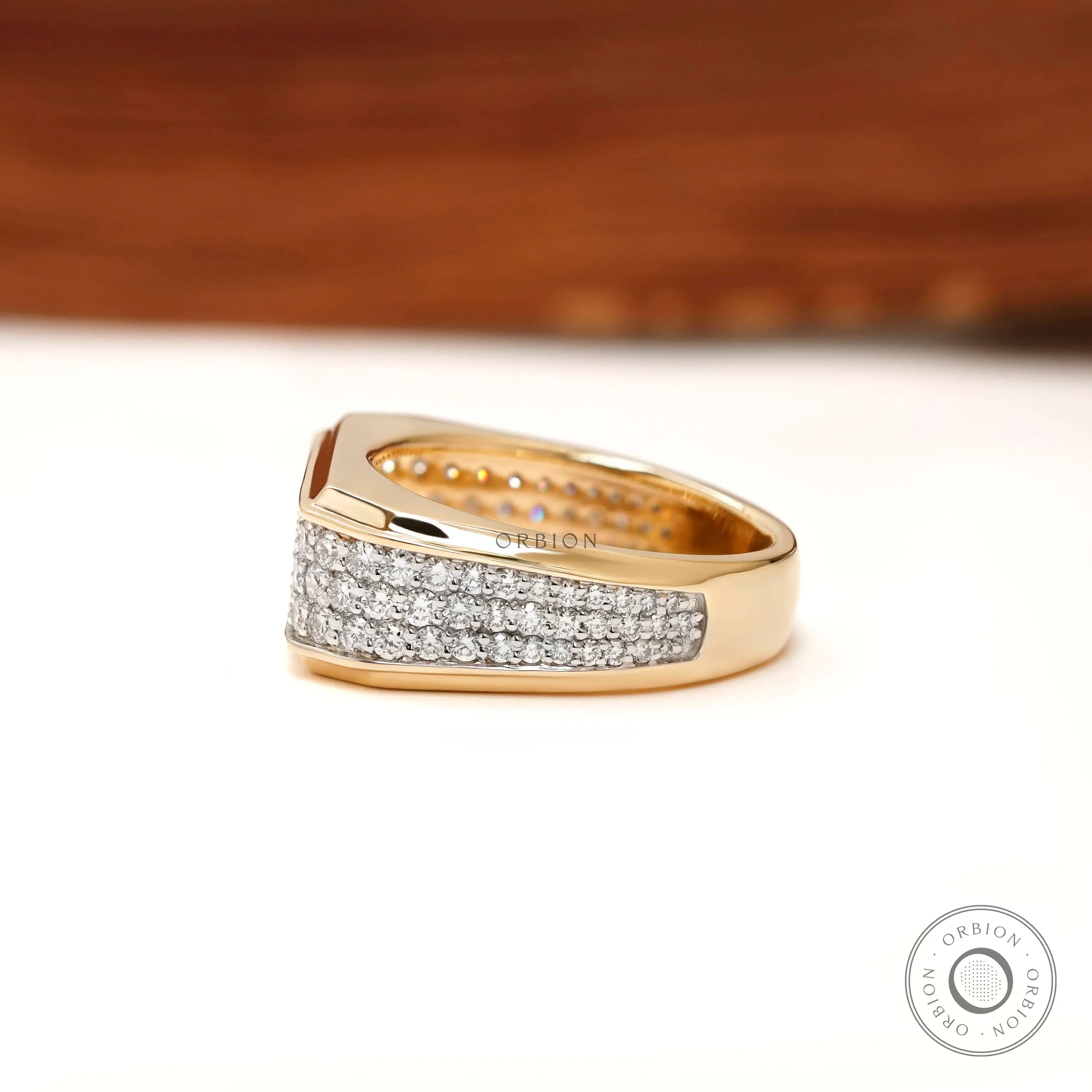 Side profile of chunky men’s wedding band with tapered shank