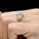 Classic three stone halo wedding engagement ring in two tone gold