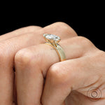 Vintage inspired moval cut engagement ring in 14K gold