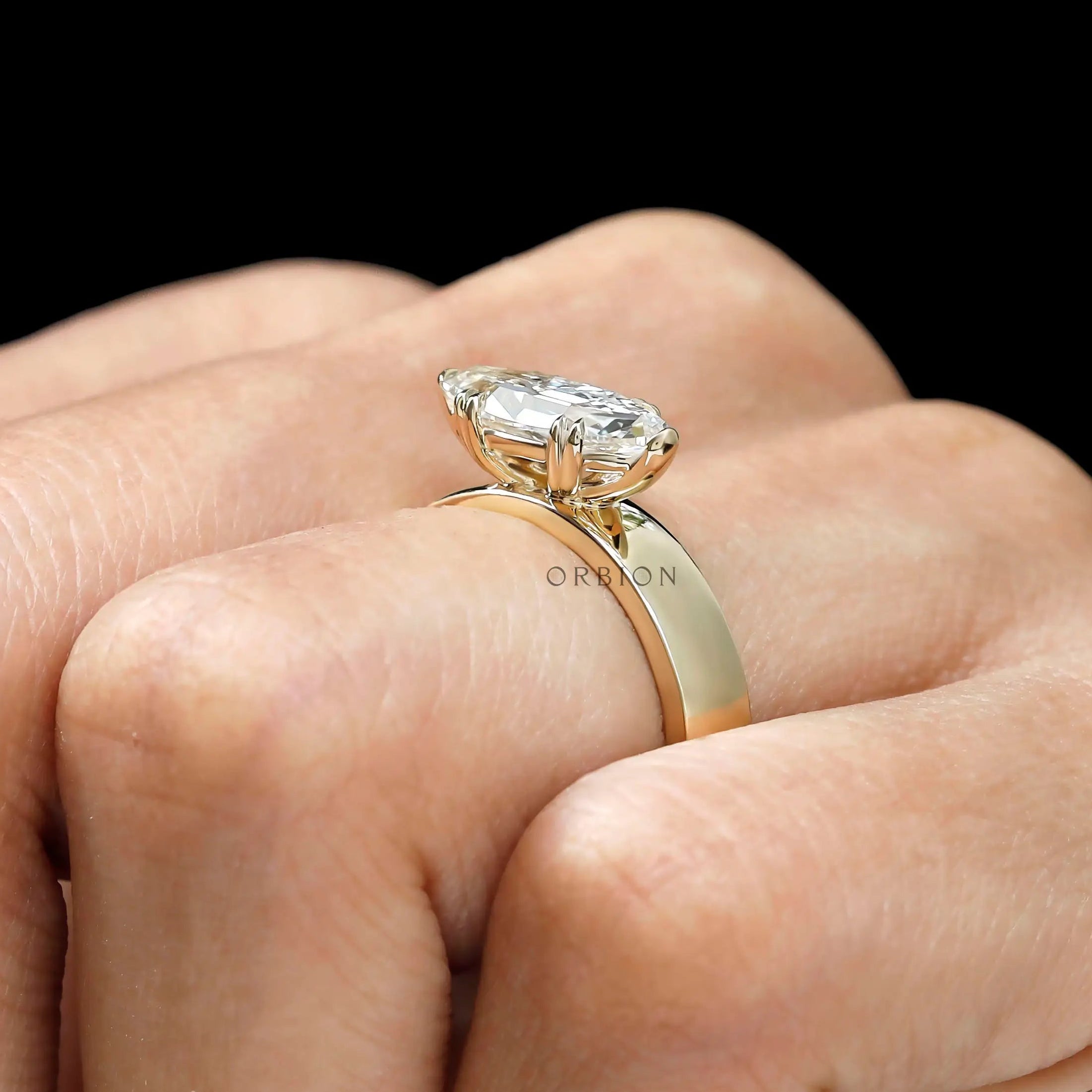 Vintage inspired moval cut engagement ring in 14K gold