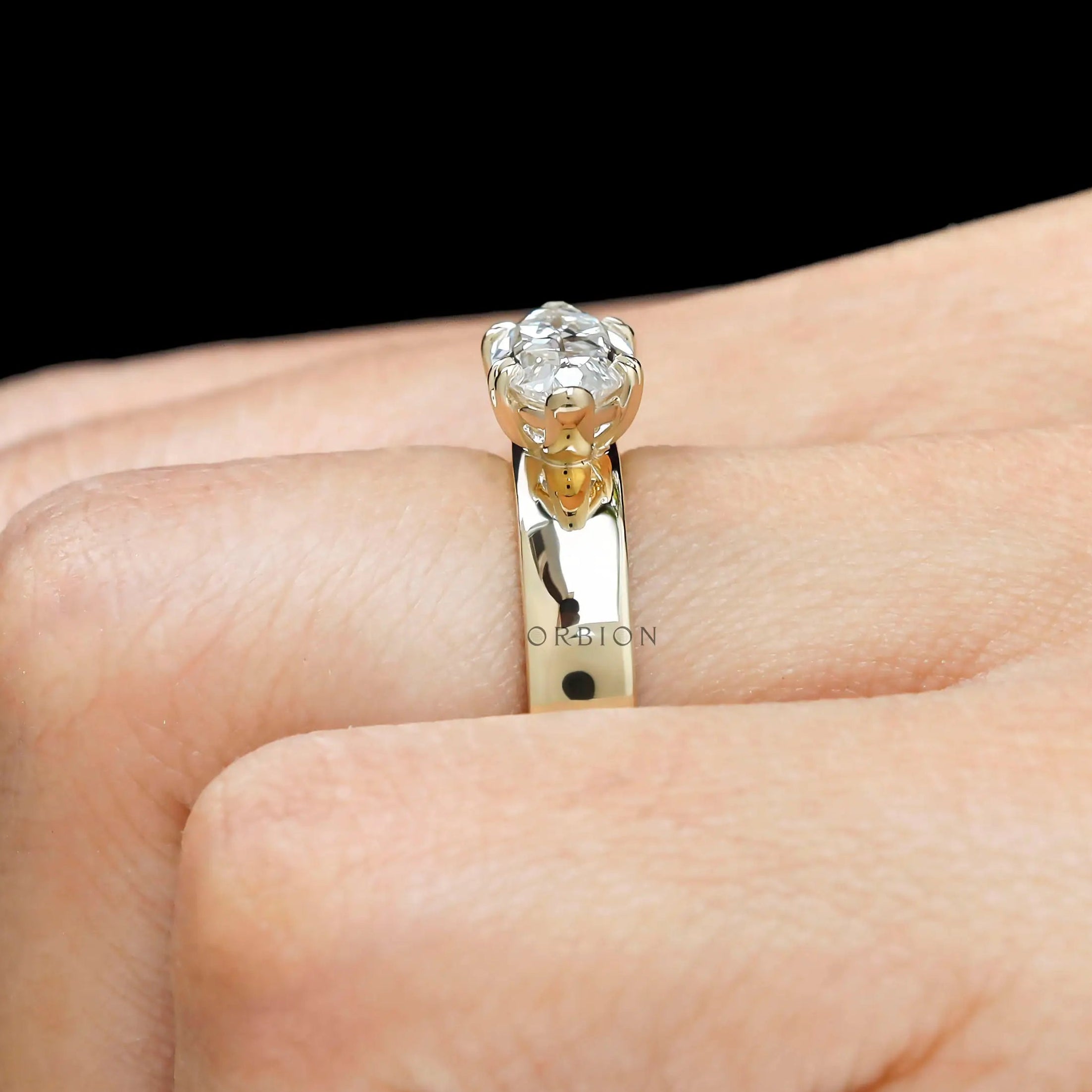 Unique antique style engagement ring with moval cut center stone