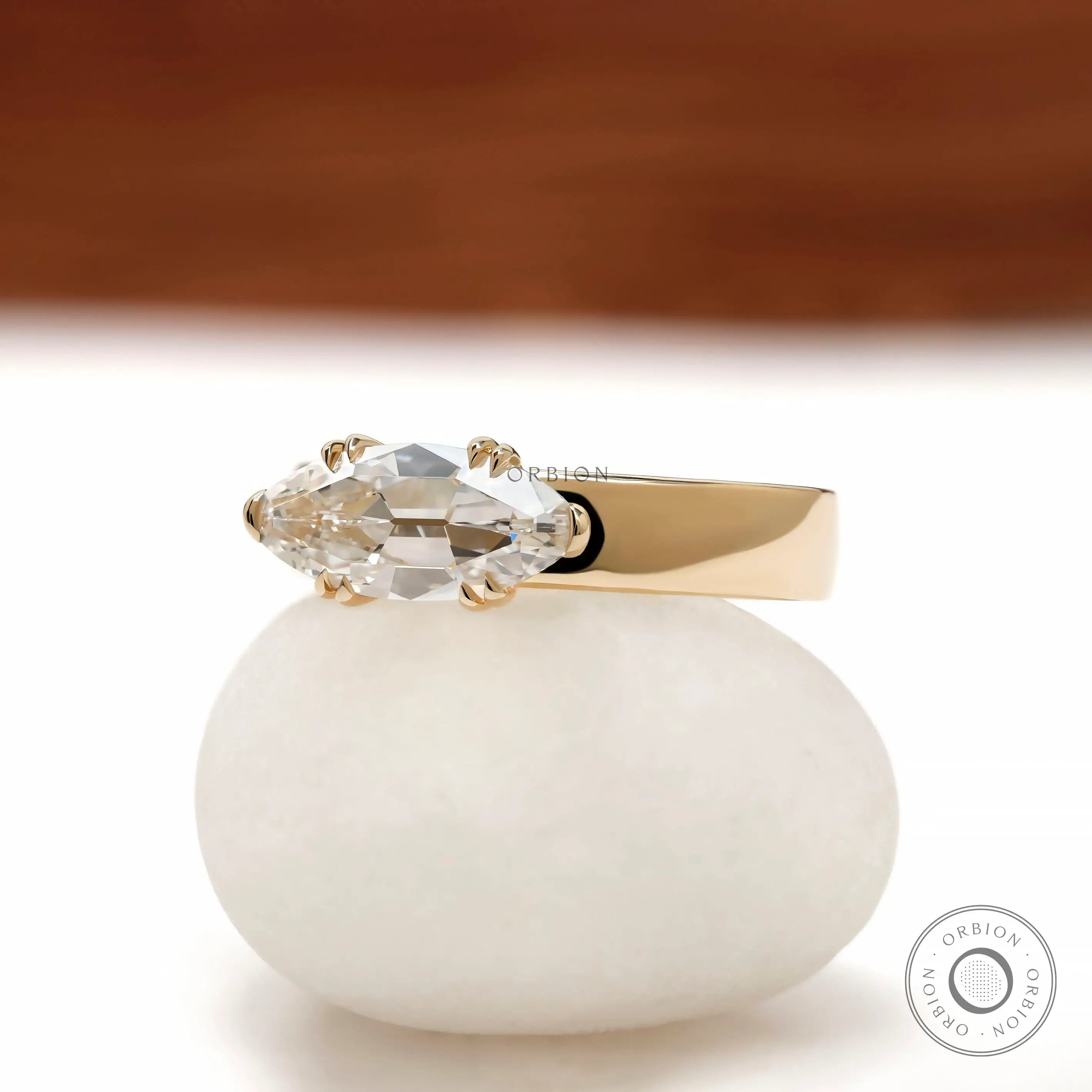 Thick band signet engagement ring with moval center stone