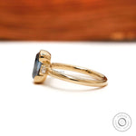 Deep blue old mine cut cushion moissanite engagement ring with polished band