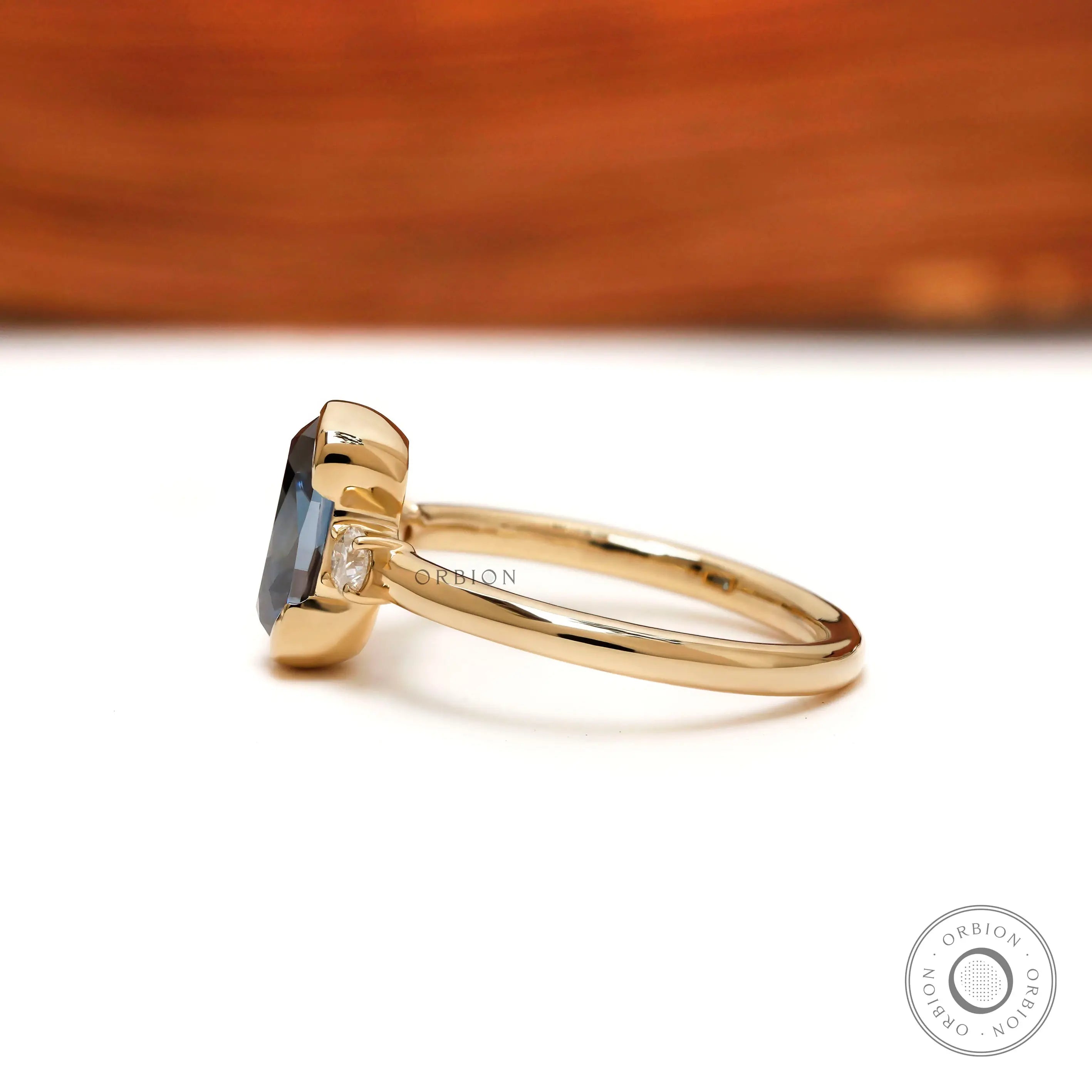 Deep blue old mine cut cushion moissanite engagement ring with polished band