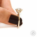 Round elongated old european cut diamond ring hand shot