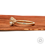 Elevated crown setting yellow gold vintage style solitaire ring