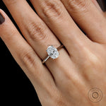 Elegant cathedral oval engagement ring close up