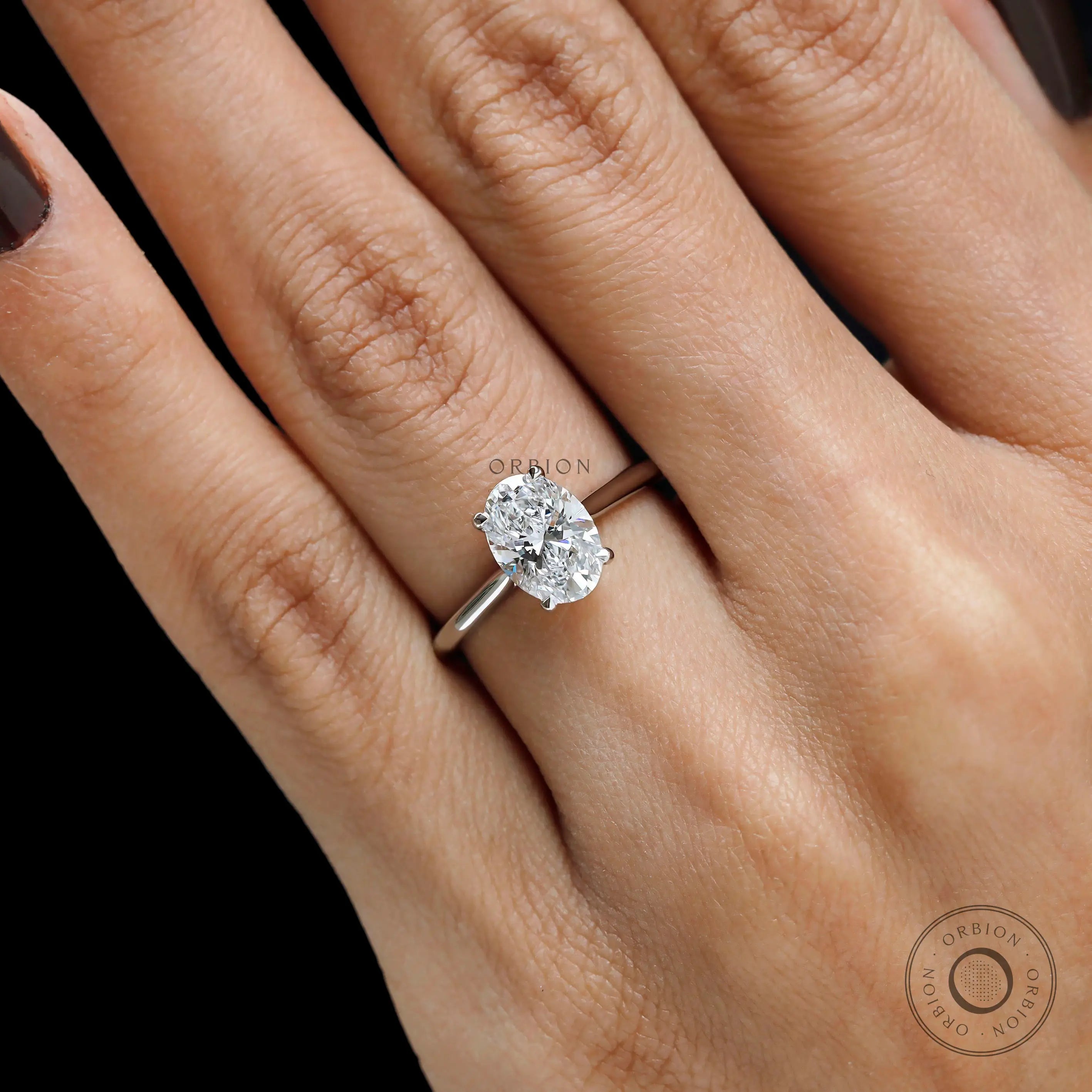 Elegant cathedral oval engagement ring close up