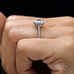 Minimalist oval diamond hidden halo engagement ring
