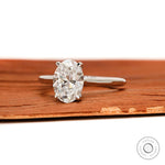 Cathedral style oval engagement ring side profile