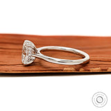Hidden halo detail beneath oval center stone