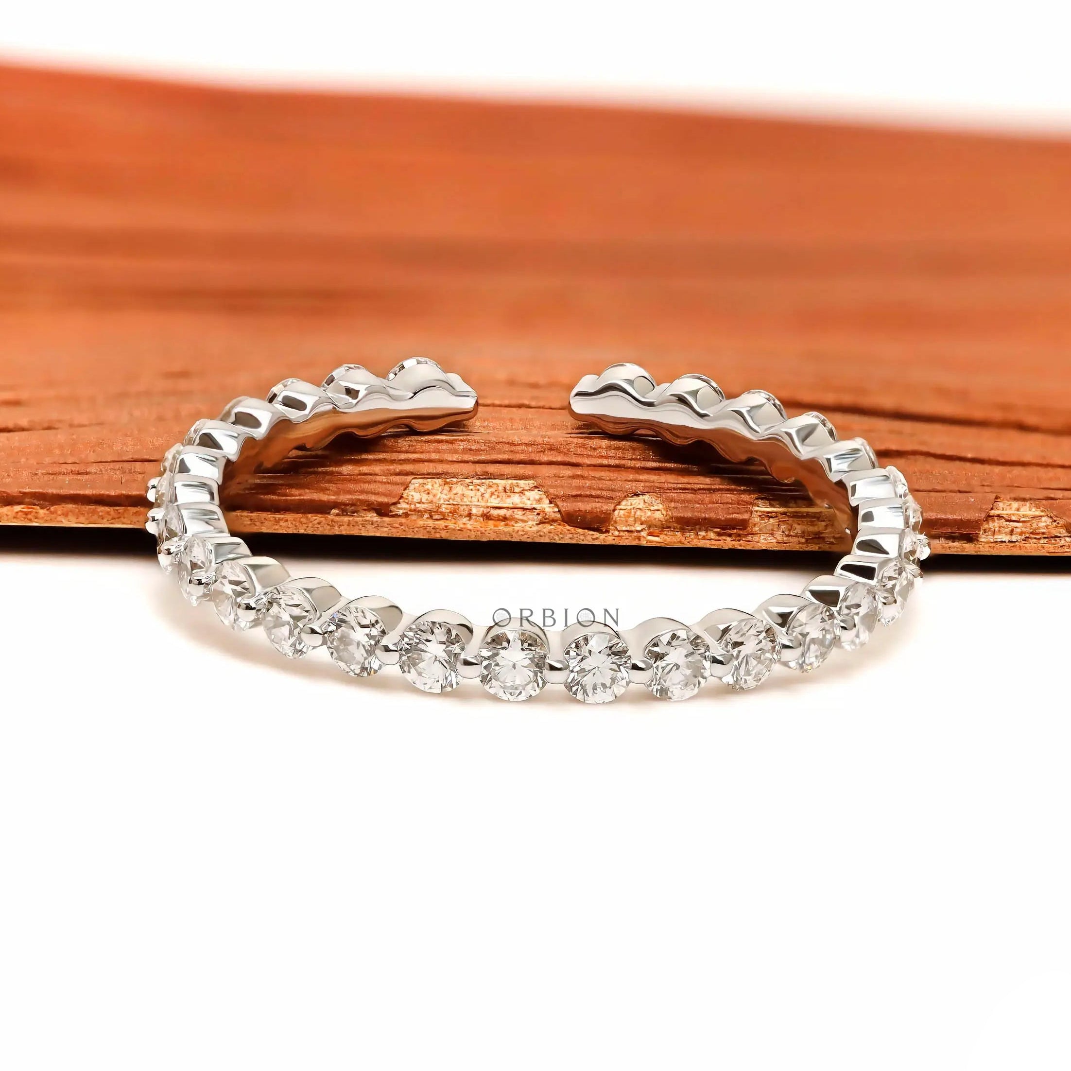 White gold shared prong open diamond band 
