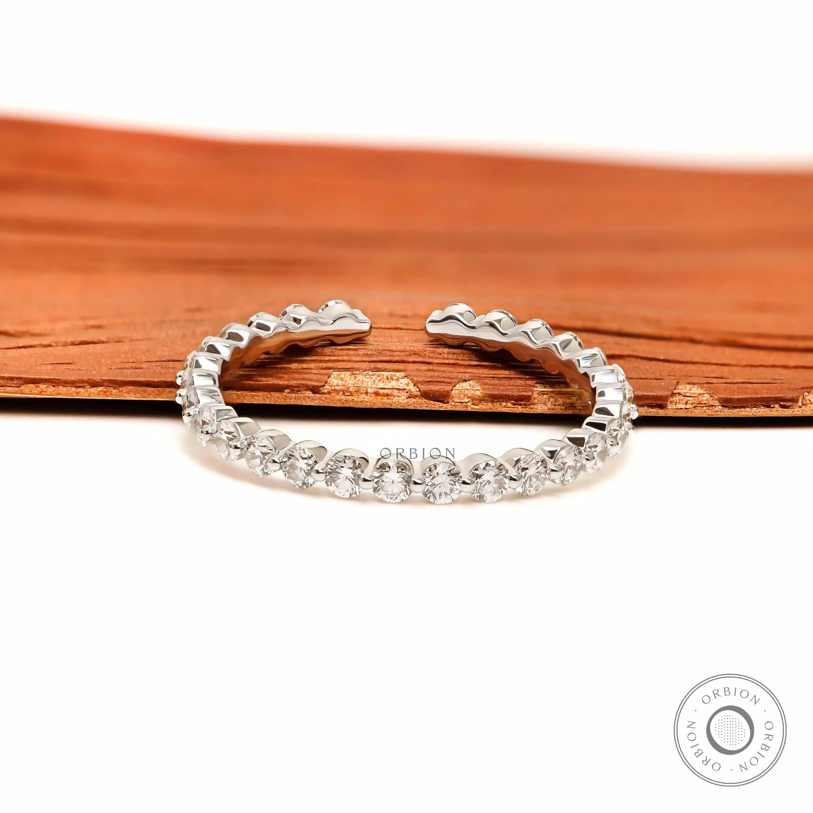 White gold shared prong open diamond band 