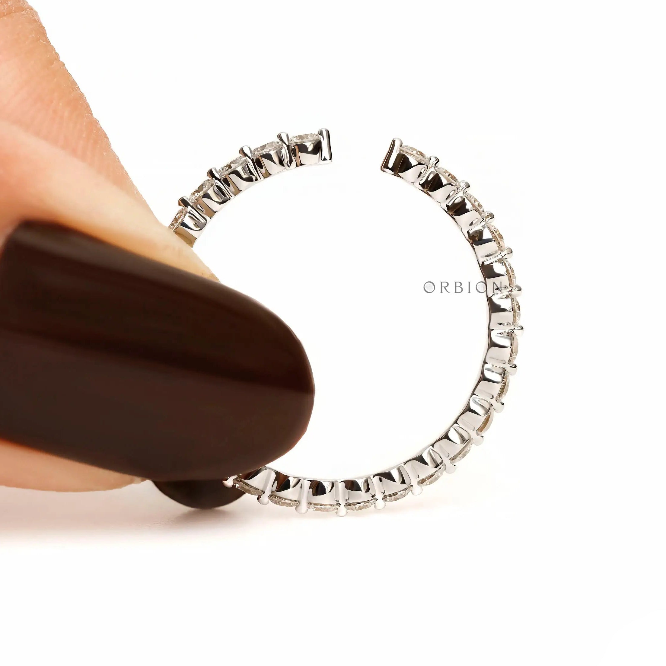 Modern open wedding band in 14K white gold