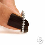 Delicate shared prong round diamond band