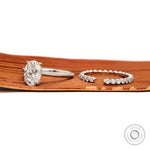 Oval moissanite bridal ring set in 14K white gold