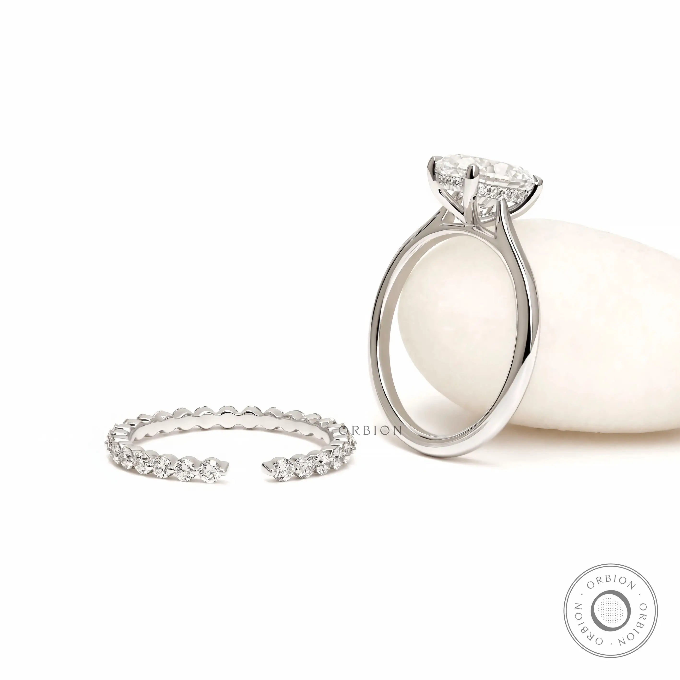 White gold oval engagement ring with hidden halo detail
