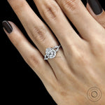 Fat pear lab grown diamond platinum solitaire with split shank and marquise round accent details