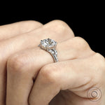 Fat pear lab diamond engagement ring in platinum with split shank design 