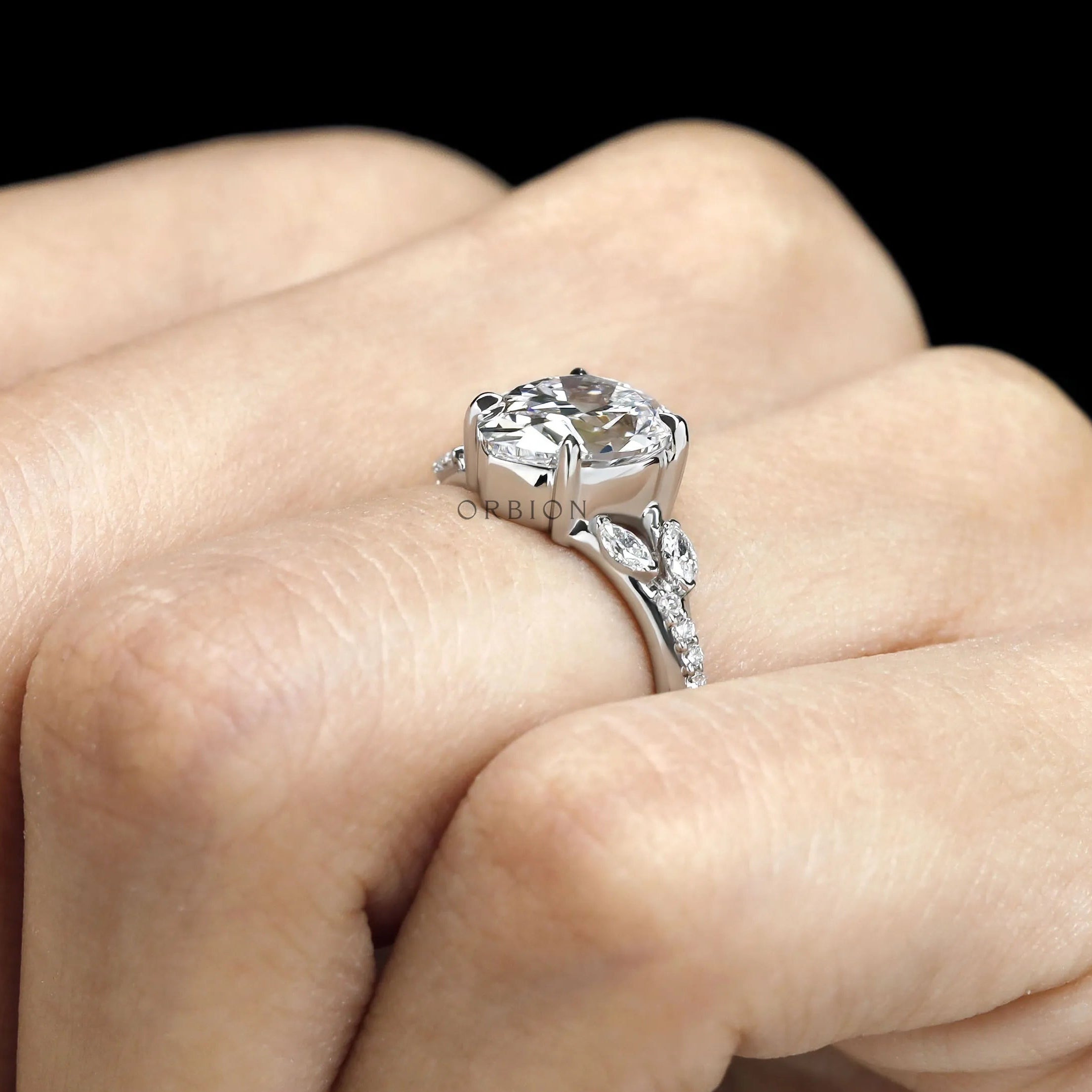 Fat pear lab diamond engagement ring in platinum with split shank design 