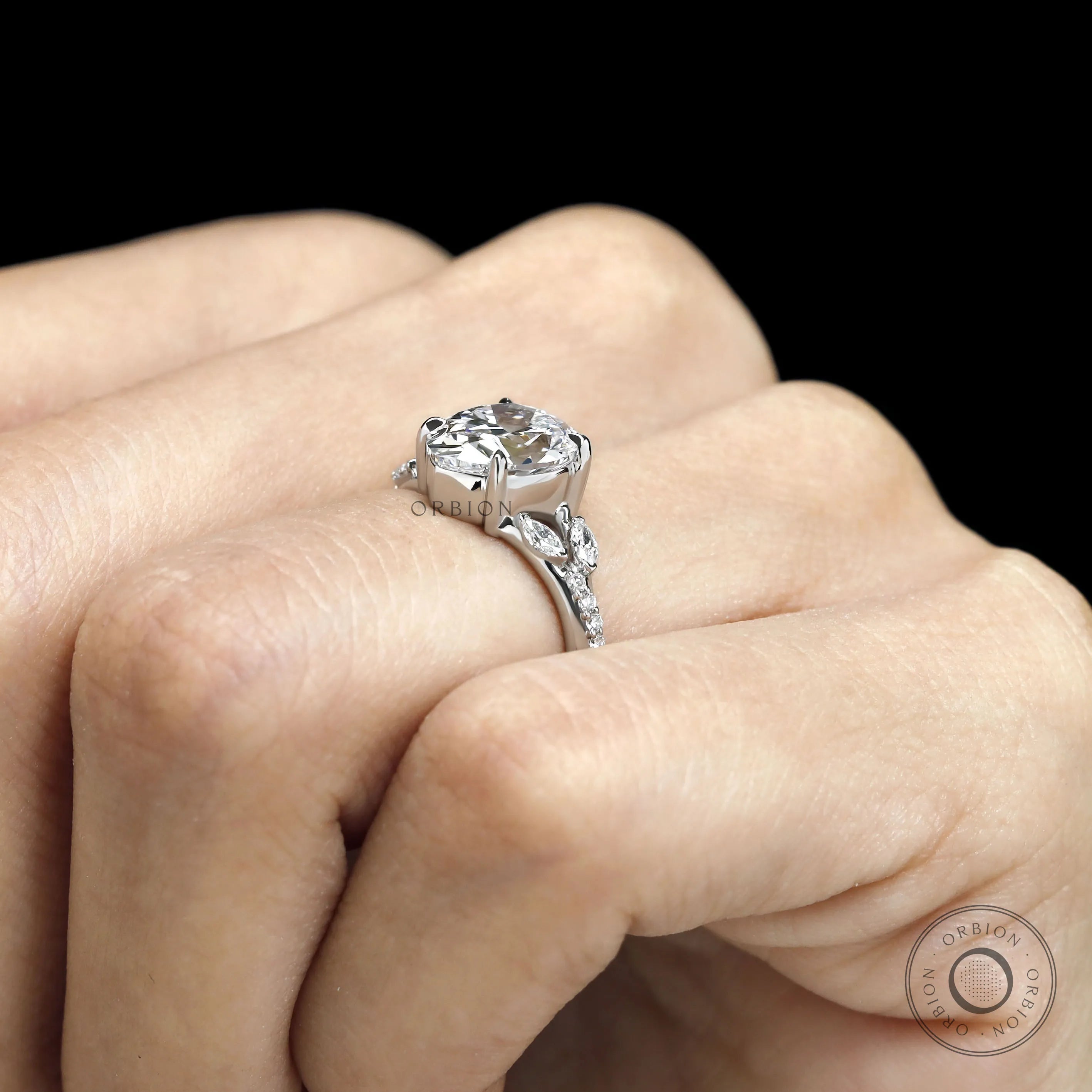 Fat pear lab diamond engagement ring in platinum with split shank design 