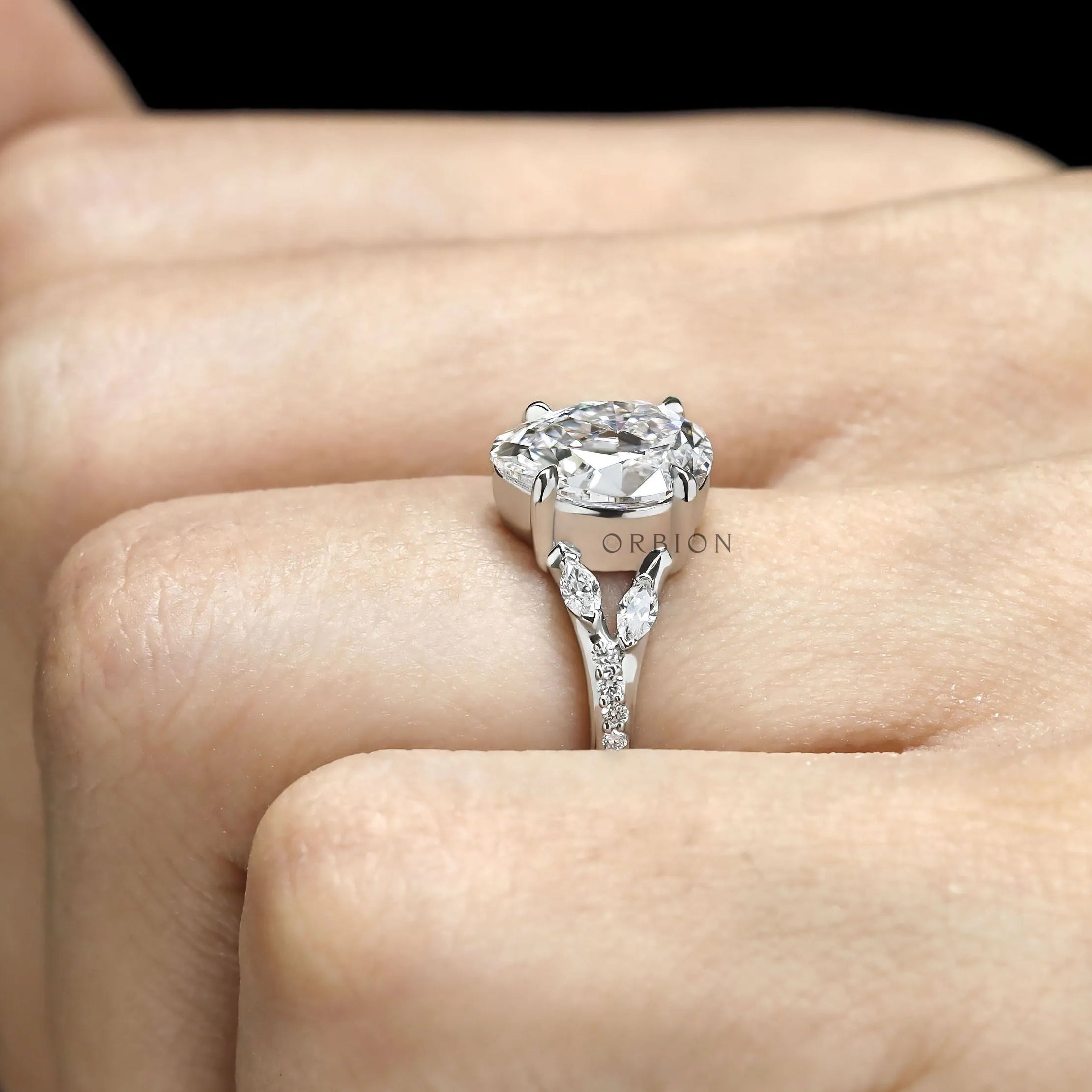 Modern platinum split shank ring with fat pear lab grown diamond