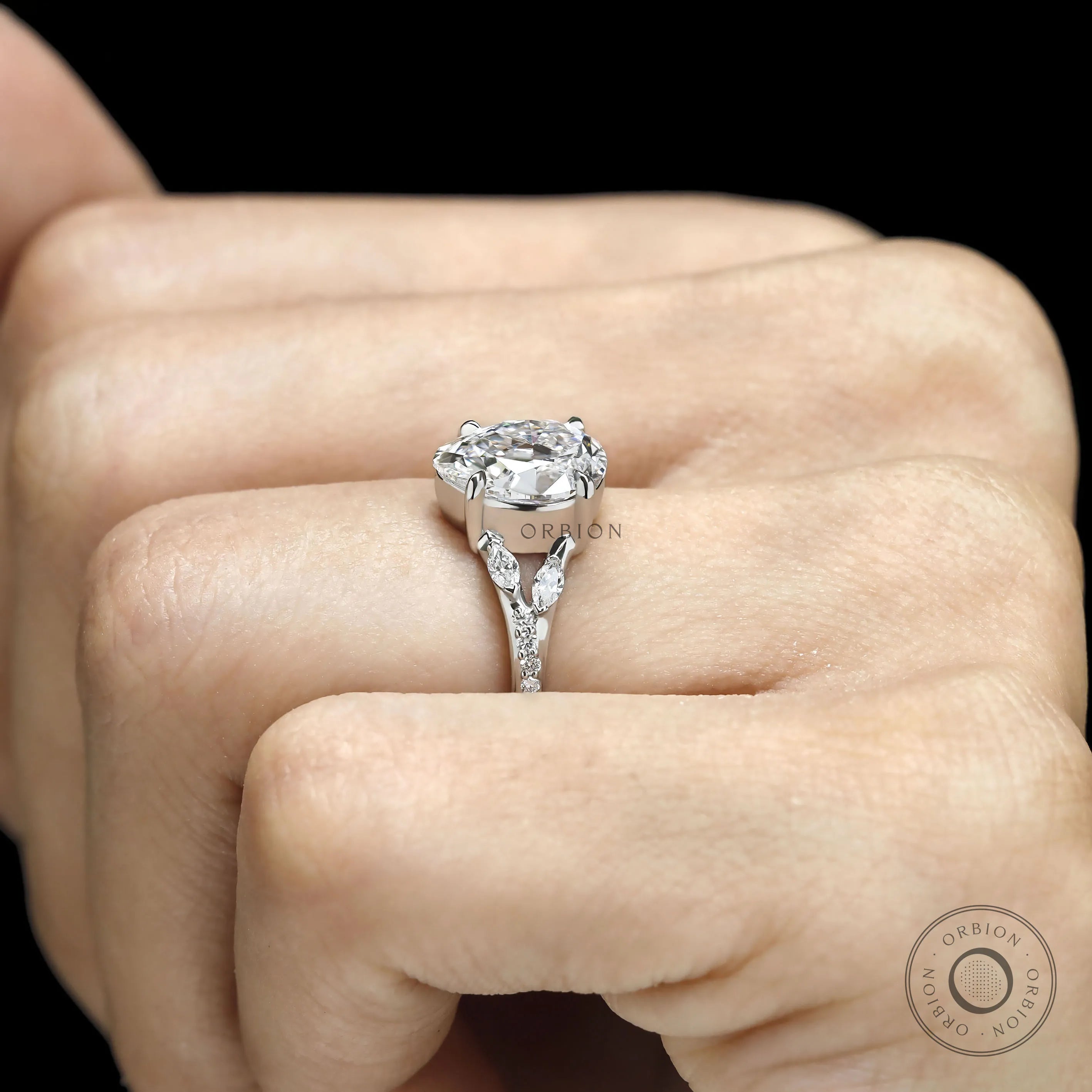 Modern platinum split shank ring with fat pear lab grown diamond
