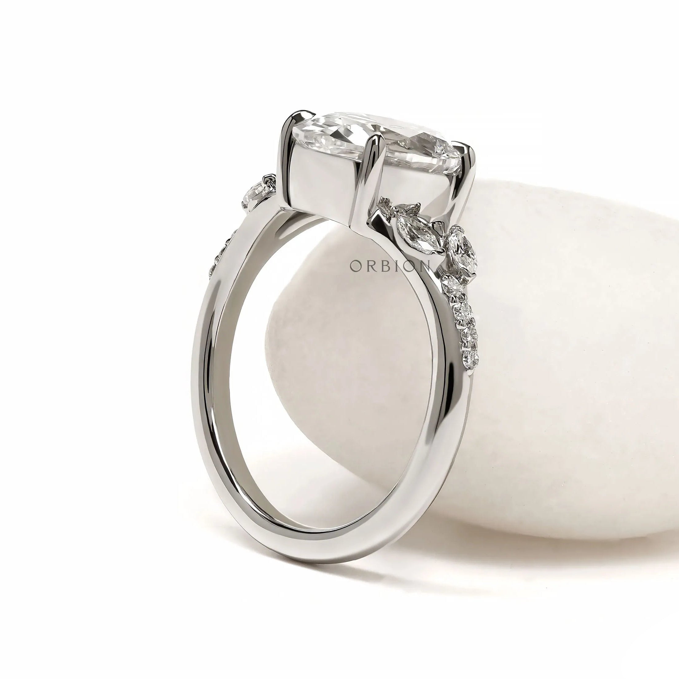 Lab grown pear-shaped diamond engagement ring with platinum split shank