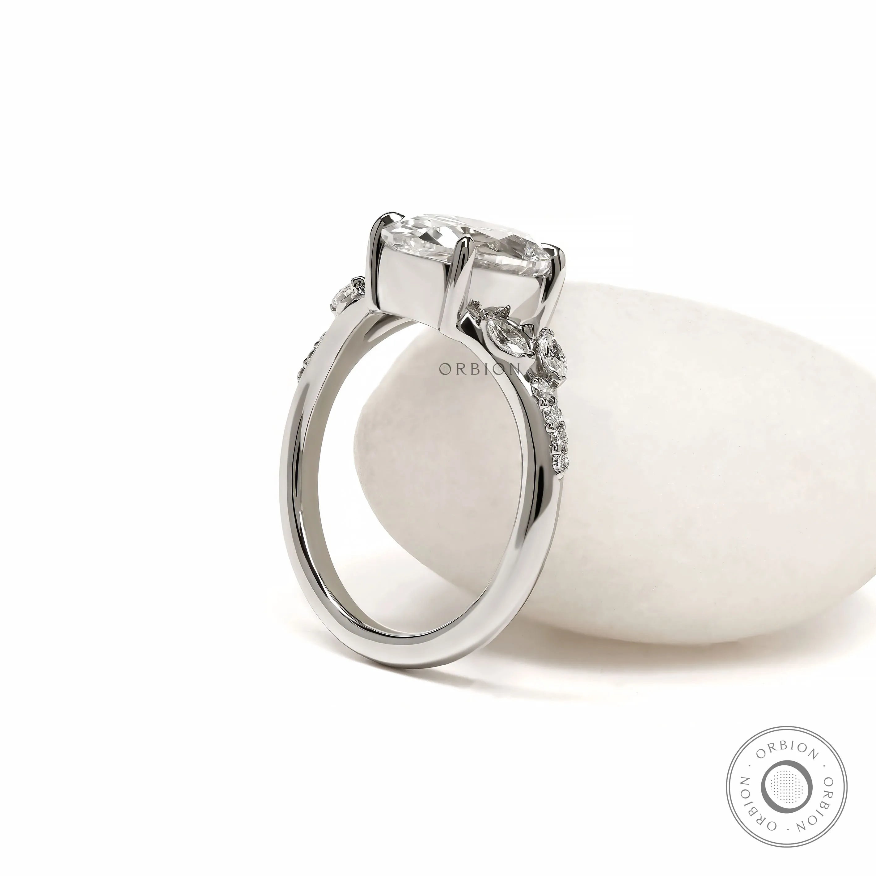 Lab grown pear-shaped diamond engagement ring with platinum split shank