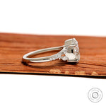 Elegant fat pear lab grown diamond ring in platinum with split shank and marquise round accents