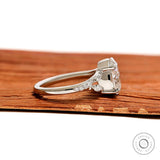 Elegant fat pear lab grown diamond ring in platinum with split shank and marquise round accents
