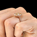 Pear moissanite rose gold engagement ring with pave band