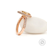 Elegant pear champagne moissanite rose gold engagement ring detail