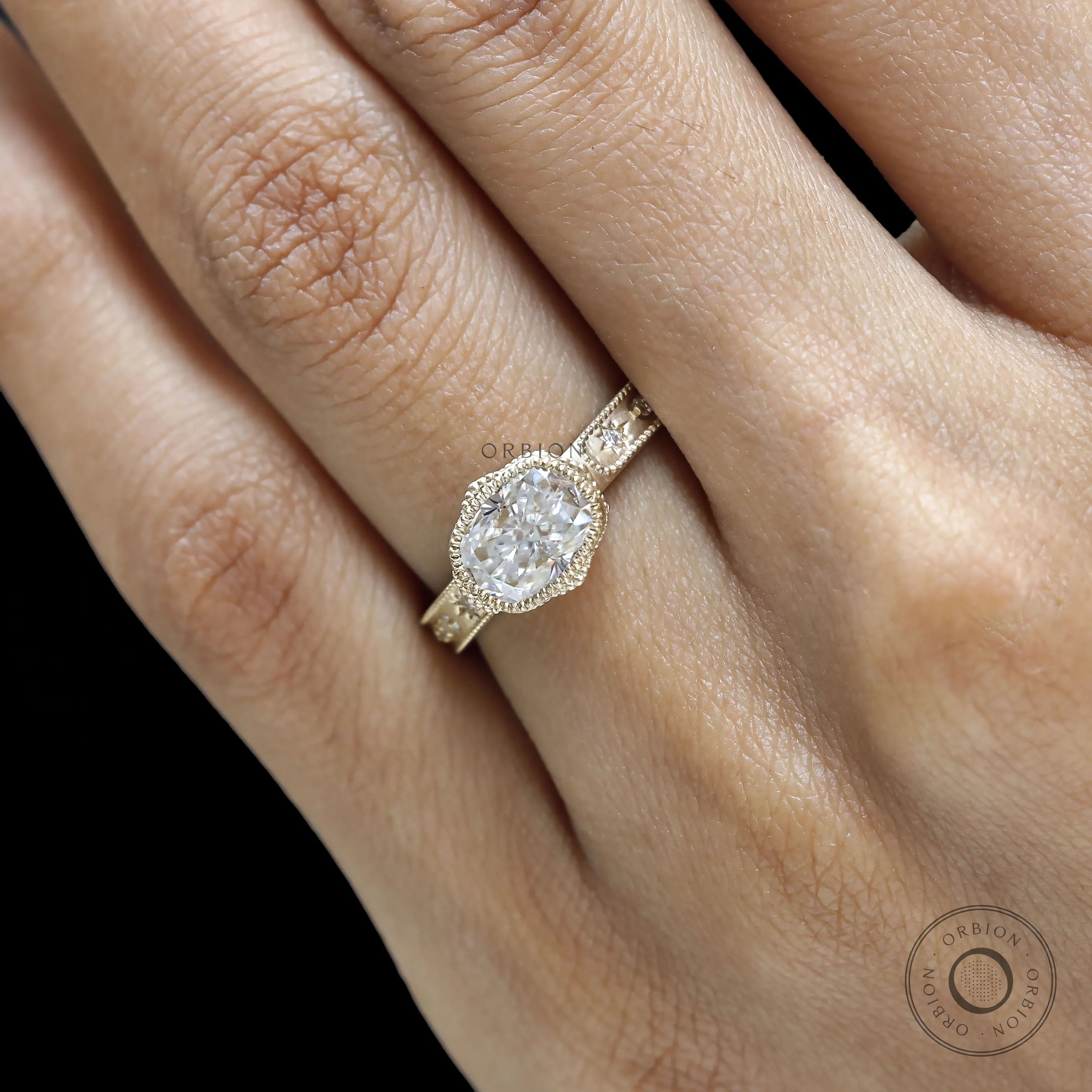 Statement cushion moissanite engagement ring in matte yellow gold