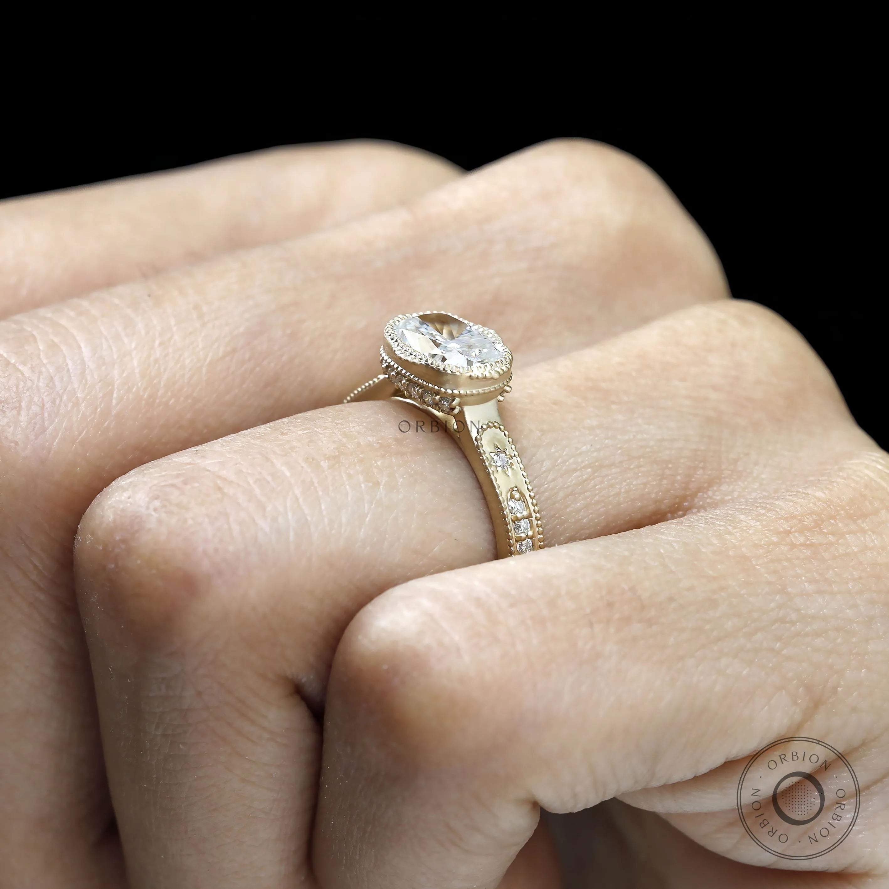 Vintage cushion moissanite ring with textured yellow gold band