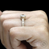 Bezel set cushion moissanite ring with milgrain detailing and thick shank