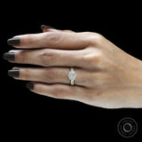 Antique inspired cushion moissanite engagement ring with milgrain bezel