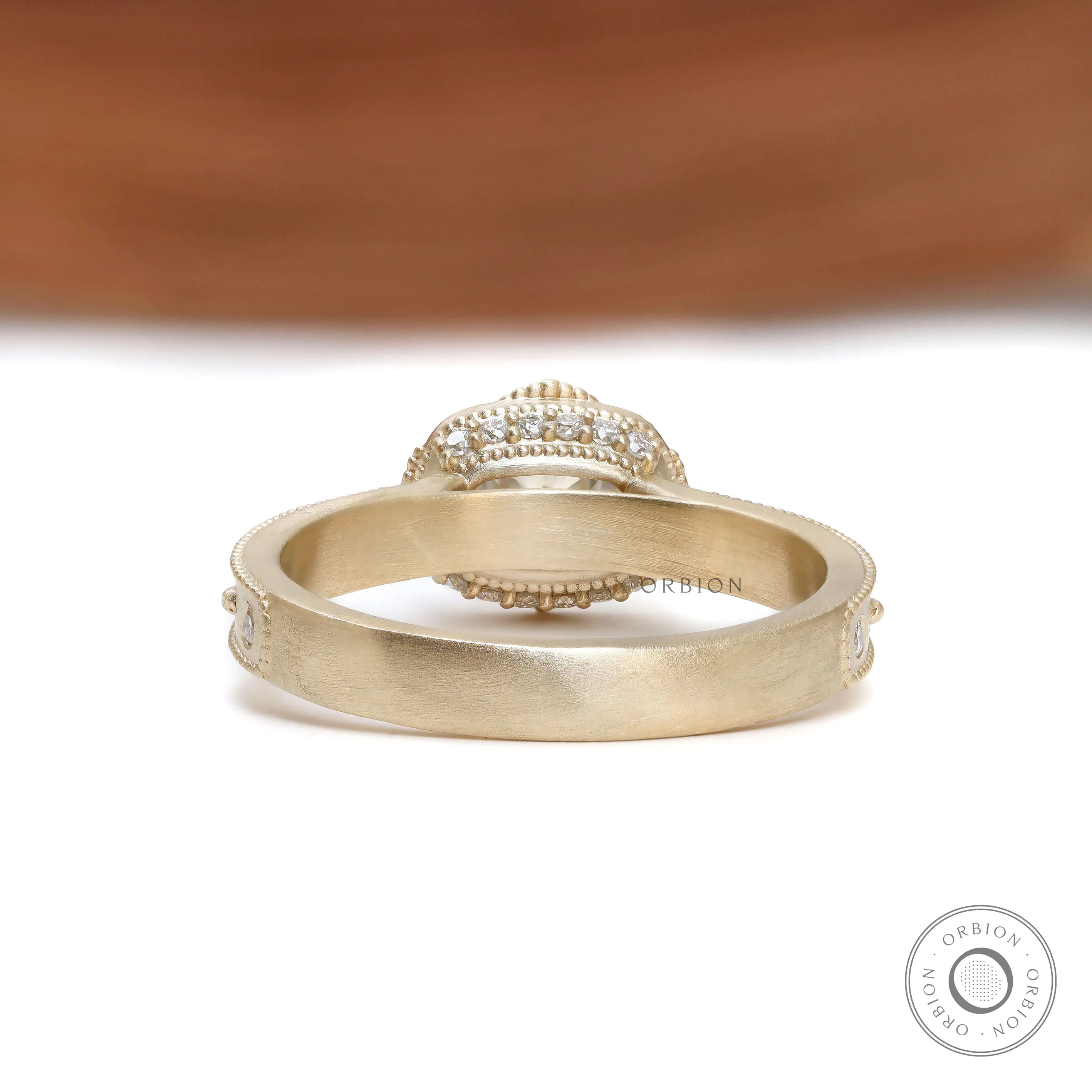 14k Yellow gold cushion moissanite ring with vintage starburst design